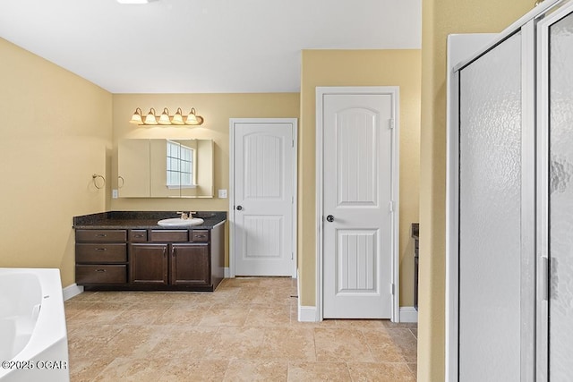 111 Zachary Ln, Carl Junction, MO 64834 - full bathroom with vanity, a shower stall, a bath, and baseboards