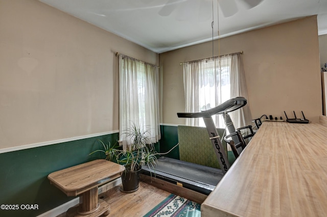 1418 Forest St, Carthage, MO 64836 - exercise area with wood finished floors and ceiling fan
