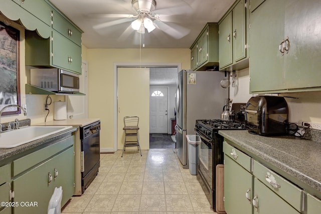 1418 Forest St, Carthage, MO 64836 - kitchen featuring black appliances, green cabinetry, ceiling fan, and a sink