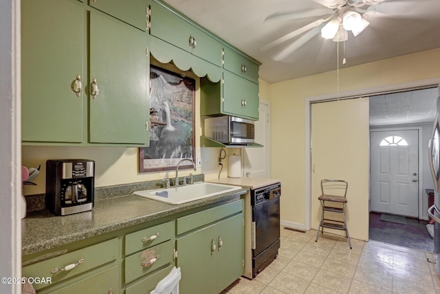 1418 Forest St, Carthage, MO 64836 - kitchen with a sink, stainless steel microwave, a ceiling fan, and black dishwasher