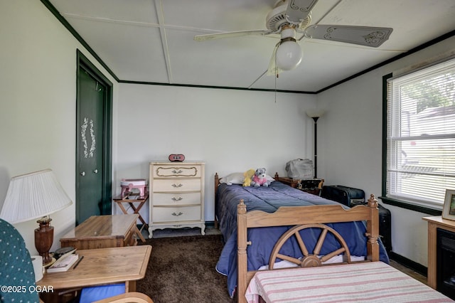 1418 Forest St, Carthage, MO 64836 - carpeted bedroom featuring a ceiling fan