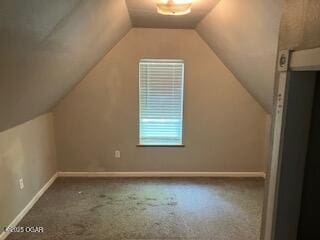 620 W 5th St, Baxter Springs, KS 66713 - additional living space with carpet, lofted ceiling, and baseboards