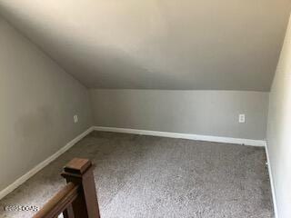 620 W 5th St, Baxter Springs, KS 66713 - additional living space with lofted ceiling, carpet, and baseboards