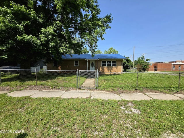 202 S Mckinley Ave, Joplin, MO 64801 - single story home with a gate and brick siding