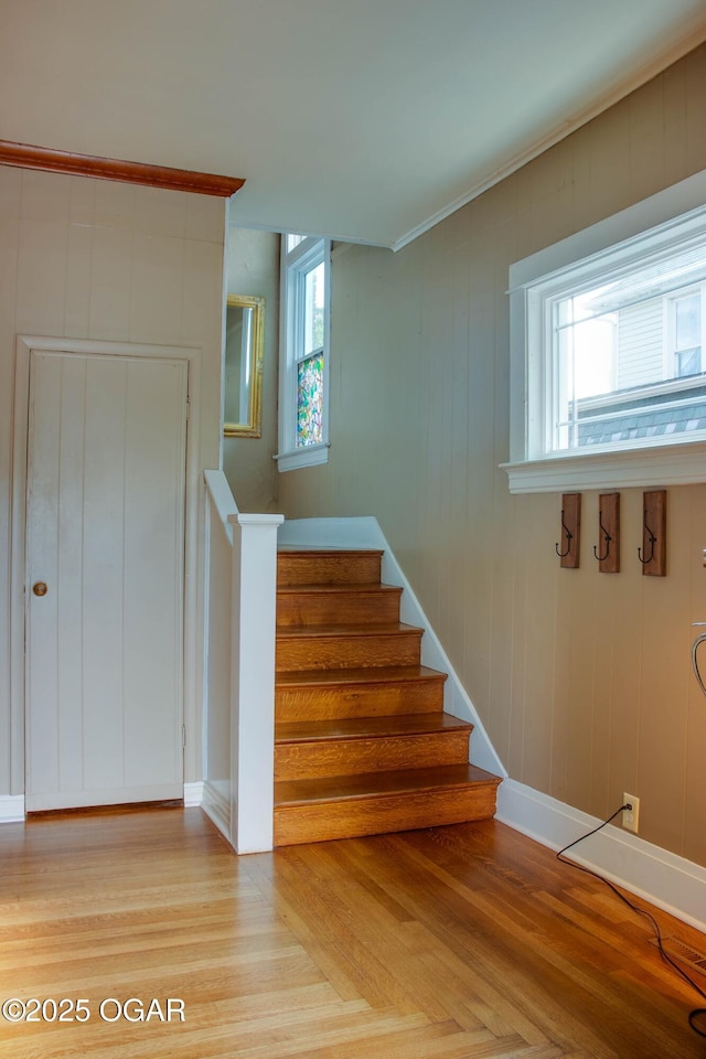 702 W Daugherty St, Webb City, MO 64870 - staircase featuring baseboards, wood finished floors, and ornamental molding