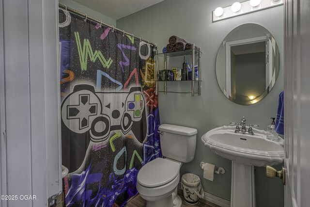 408 W Walton Ave, Carl Junction, MO 64834 - bathroom with toilet and a shower with curtain