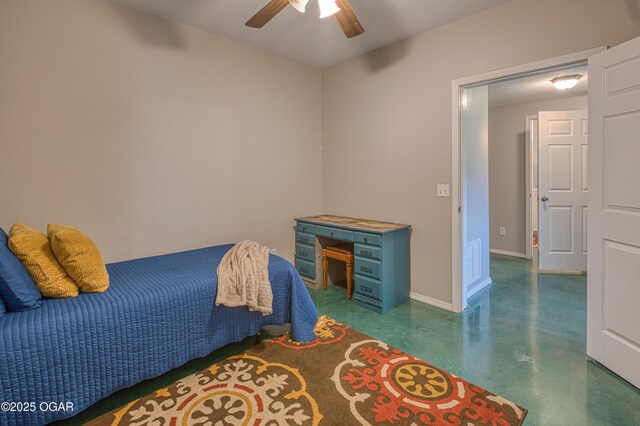 408 W Walton Ave, Carl Junction, MO 64834 - bedroom with finished concrete flooring, baseboards, and a ceiling fan