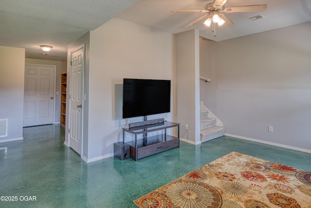 408 W Walton Ave, Carl Junction, MO 64834 - unfurnished living room with baseboards, a ceiling fan, and stairs
