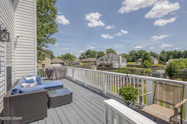 408 W Walton Ave, Carl Junction, MO 64834 - wooden deck featuring a fenced backyard, area for grilling, a residential view, and an outdoor living space