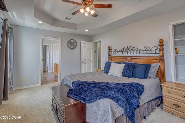 408 W Walton Ave, Carl Junction, MO 64834 - bedroom featuring recessed lighting, light colored carpet, baseboards, a raised ceiling, and connected bathroom