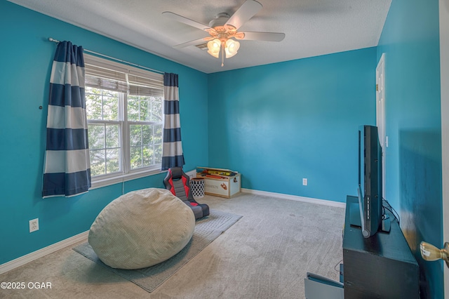 408 W Walton Ave, Carl Junction, MO 64834 - game room featuring carpet, a ceiling fan, baseboards, and a textured ceiling