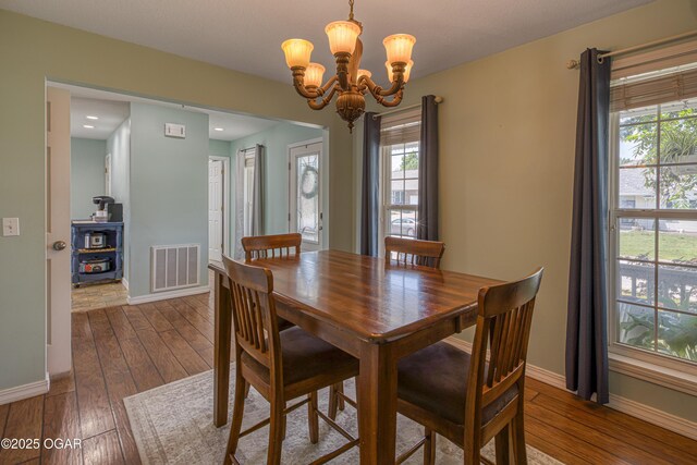 408 W Walton Ave, Carl Junction, MO 64834 - dining area featuring a chandelier, dark wood-style flooring, healthy amount of natural light, baseboards, and recessed lighting