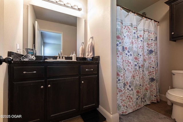 102 Zachary Ln, Carl Junction, MO 64834 - bathroom featuring toilet, vanity, baseboards, and tile patterned floors
