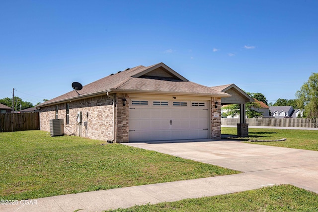 102 Zachary Ln, Carl Junction, MO 64834 - view of front of home with central air condition unit, an attached garage, concrete driveway, brick siding, and roof with shingles