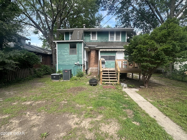 206 S Connor Ave, Joplin, MO 64801 - rear view of property featuring a wooden deck, stairway, and central AC unit