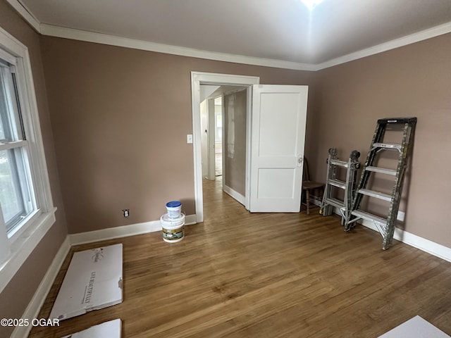 206 S Connor Ave, Joplin, MO 64801 - unfurnished room with crown molding, baseboards, and wood finished floors