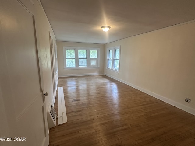 206 S Connor Ave, Joplin, MO 64801 - empty room with hardwood / wood-style flooring and baseboards