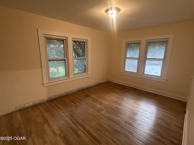 206 S Connor Ave, Joplin, MO 64801 - empty room with wood finished floors and baseboards