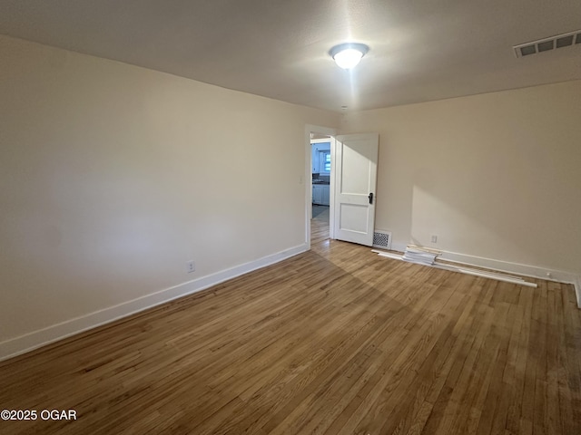 206 S Connor Ave, Joplin, MO 64801 - unfurnished room with wood finished floors and baseboards
