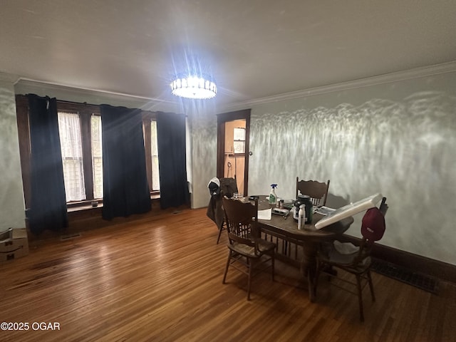 206 S Connor Ave, Joplin, MO 64801 - dining room featuring wood finished floors and ornamental molding