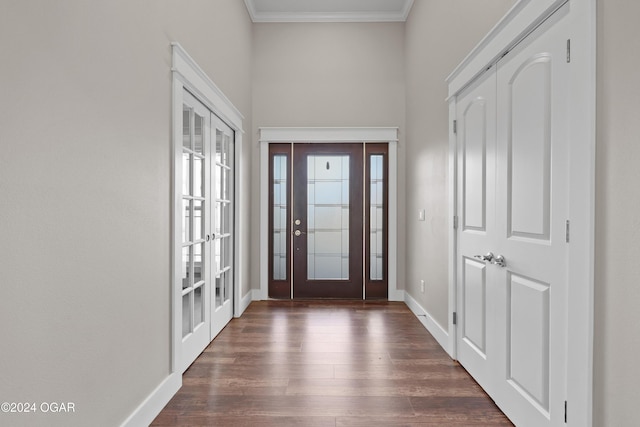 216 Timber Trail Dr, Joplin, MO 64804 - foyer entrance featuring french doors, crown molding, dark wood-style floors, baseboards, and a towering ceiling