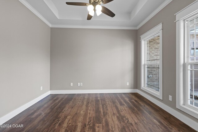 216 Timber Trail Dr, Joplin, MO 64804 - unfurnished room with a tray ceiling, dark wood-type flooring, a ceiling fan, baseboards, and ornamental molding