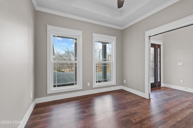 216 Timber Trail Dr, Joplin, MO 64804 - unfurnished room featuring dark wood-type flooring, ceiling fan, crown molding, and baseboards