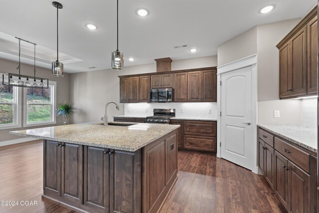 216 Timber Trail Dr, Joplin, MO 64804 - kitchen featuring stainless steel appliances, a sink, dark wood-type flooring, tasteful backsplash, and recessed lighting