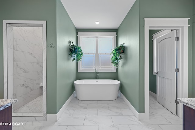 216 Timber Trail Dr, Joplin, MO 64804 - full bathroom with baseboards, marble look tiles, vanity, a soaking tub, and recessed lighting