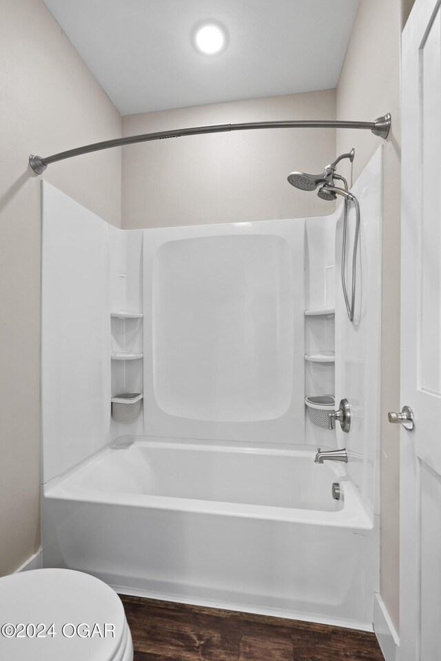 216 Timber Trail Dr, Joplin, MO 64804 - bathroom with toilet, shower / bathtub combination, wood finished floors, and recessed lighting