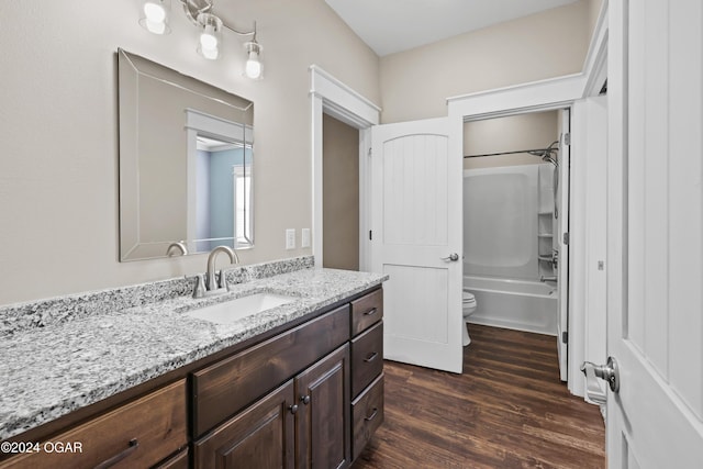 216 Timber Trail Dr, Joplin, MO 64804 - bathroom featuring vanity, toilet, wood finished floors, and shower / bath combination
