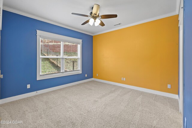 216 Timber Trail Dr, Joplin, MO 64804 - carpeted spare room featuring ornamental molding, a ceiling fan, and baseboards