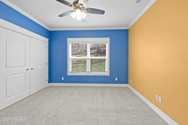 216 Timber Trail Dr, Joplin, MO 64804 - unfurnished bedroom featuring carpet floors, crown molding, baseboards, and a closet