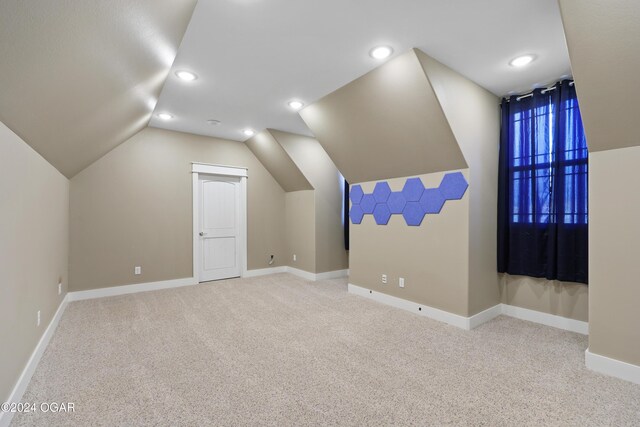 216 Timber Trail Dr, Joplin, MO 64804 - additional living space featuring carpet flooring, lofted ceiling, recessed lighting, and baseboards