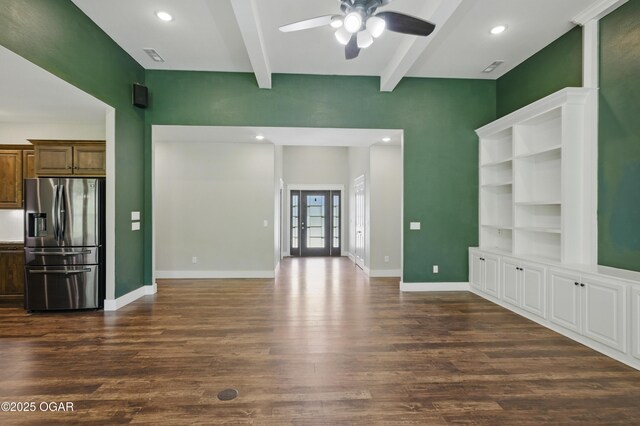 216 Timber Trail Dr, Joplin, MO 64804 - unfurnished living room featuring a ceiling fan, dark wood-type flooring, beamed ceiling, baseboards, and french doors