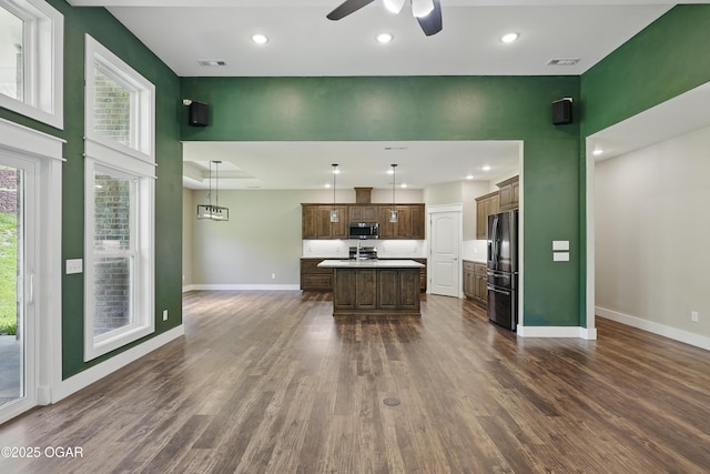 216 Timber Trail Dr, Joplin, MO 64804 - living area featuring a ceiling fan, baseboards, dark wood-style floors, and recessed lighting