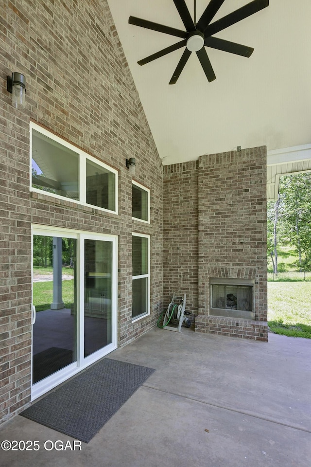 216 Timber Trail Dr, Joplin, MO 64804 - view of patio / terrace with an outdoor brick fireplace and ceiling fan