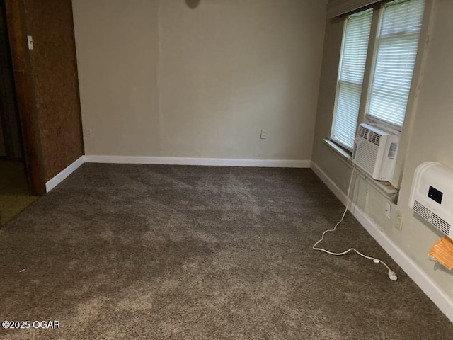 205 S Mccoy Ave, Joplin, MO 64801 - spare room featuring dark carpet, cooling unit, and a wall unit AC