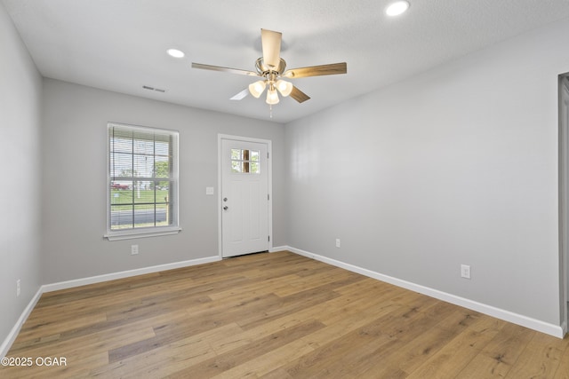 504 S Mckinley Ave, Joplin, MO 64801 - foyer entrance with light wood-style flooring, baseboards, ceiling fan, and recessed lighting