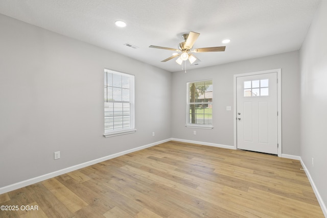 504 S Mckinley Ave, Joplin, MO 64801 - entrance foyer with ceiling fan, baseboards, light wood finished floors, and recessed lighting