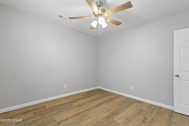 504 S Mckinley Ave, Joplin, MO 64801 - spare room featuring baseboards, light wood finished floors, and a ceiling fan