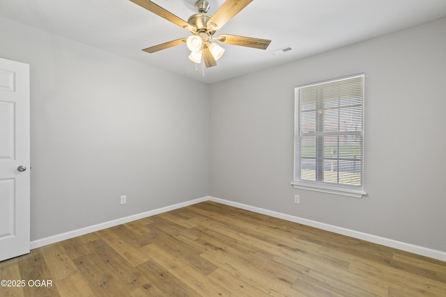 504 S Mckinley Ave, Joplin, MO 64801 - empty room featuring baseboards and light wood-type flooring