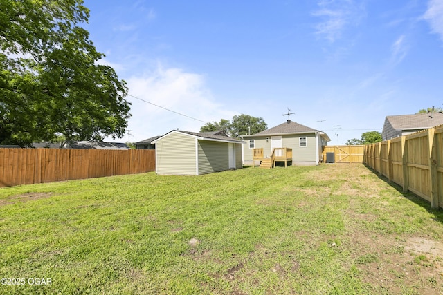 504 S Mckinley Ave, Joplin, MO 64801 - view of yard featuring a wooden deck and cooling unit