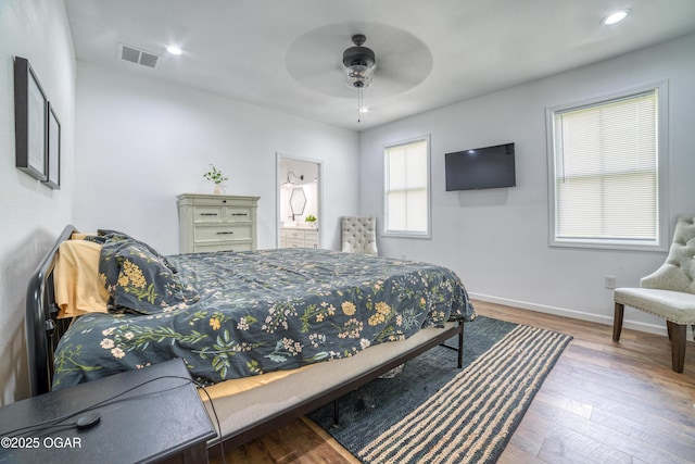 2010 Cherry St, Seneca, MO 64865 - bedroom featuring wood finished floors, baseboards, recessed lighting, and a ceiling fan