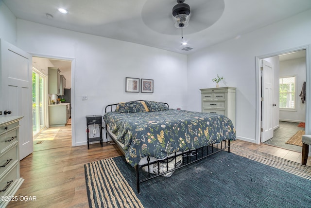 2010 Cherry St, Seneca, MO 64865 - bedroom featuring wood-type flooring, baseboards, and a ceiling fan