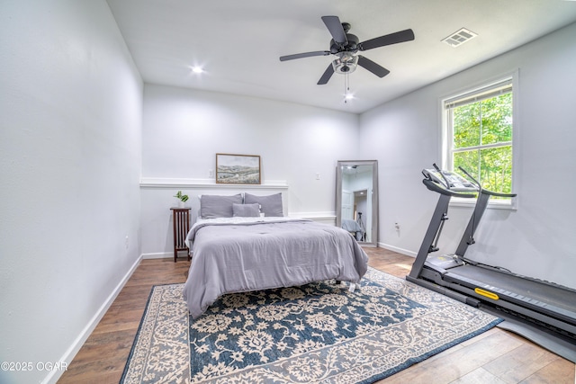 2010 Cherry St, Seneca, MO 64865 - bedroom with wood finished floors, baseboards, and a ceiling fan