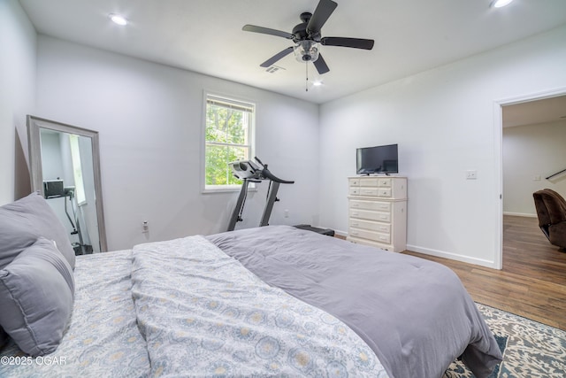 2010 Cherry St, Seneca, MO 64865 - bedroom featuring wood finished floors, recessed lighting, ceiling fan, and baseboards