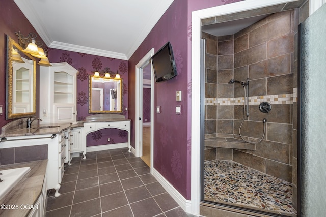 1704 Liam St, Carthage, MO 64836 - full bathroom with double vanity, tile patterned floors, tiled shower, and crown molding