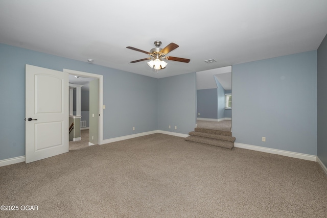 1704 Liam St, Carthage, MO 64836 - unfurnished room with carpet flooring, a ceiling fan, stairway, and baseboards