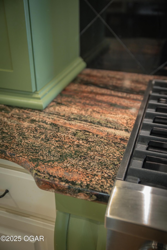 1704 Liam St, Carthage, MO 64836 - detailed view of green cabinets and dark countertops